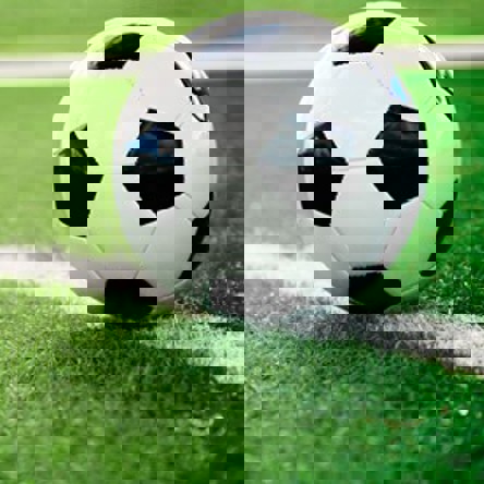 Football on pitch line